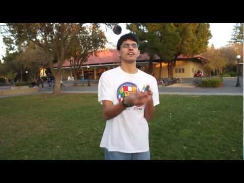 Solving A Rubik's Cube While Juggling